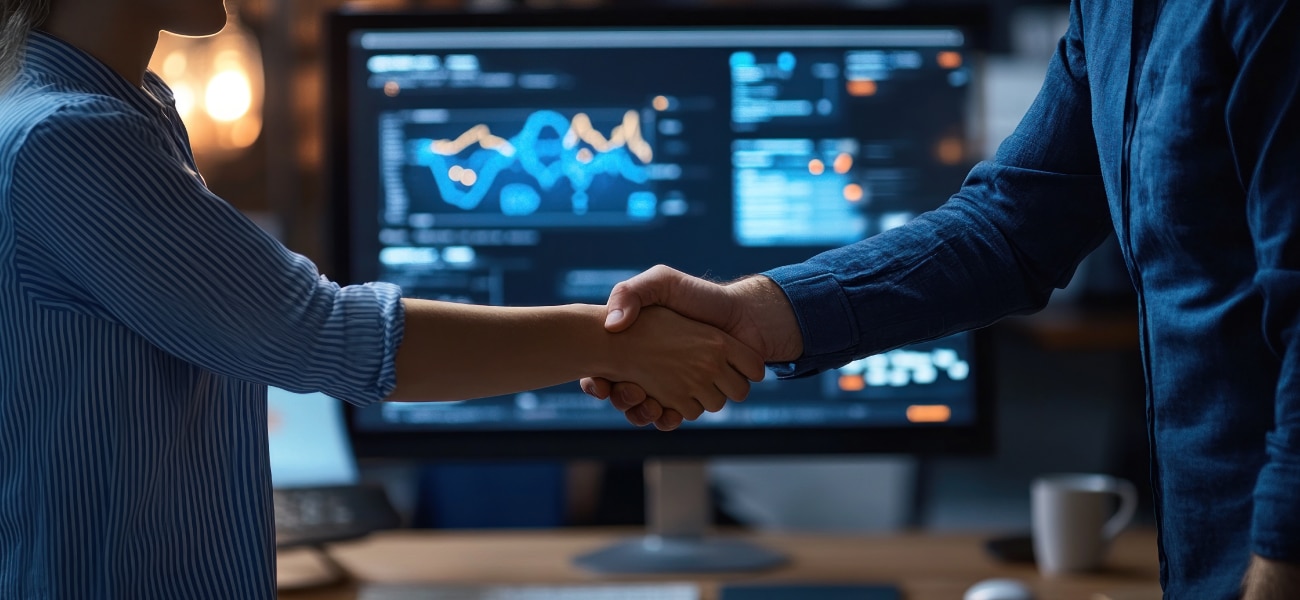 Business partners shaking hands with AI-driven sales analytics in the background.